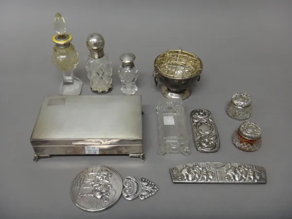 Silver and silver mounted wares, comprising; a rectangular hinge lidded jewellery box, lined within, the lid engine turned and raised on four feet, Bi