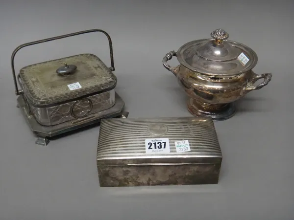 A silver rectangular table cigarette box, wooden lined within, Birmingham 1945, a plated sardine dish stand, with a detachable cover and having a face