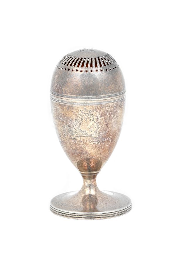 A George III silver caster, of oval form, pierced to the detachable top, gilt within, raised on a reeded circular foot, London 1794, height 9.5cm, wei