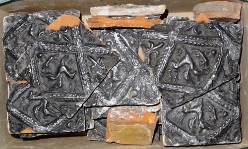 Assorted tiles, including; 19th century and later examples, Eastern black glazed terracotta examples and further Dutch examples, (a.f) (qty). S4