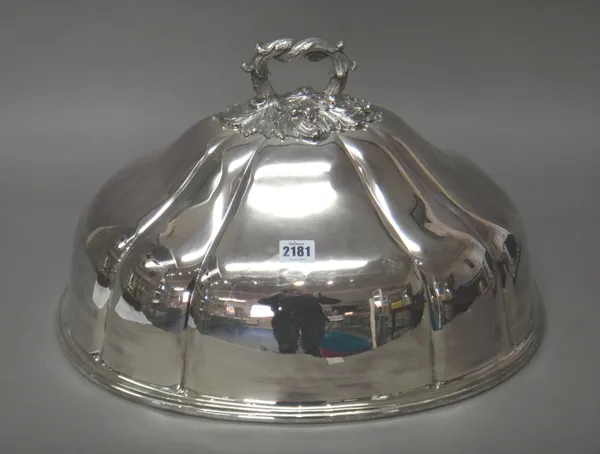 A Victorian plated large oval meat dome, the detachable handle cast with floral and foliate decoration, length 50 cm.