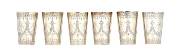 A set of six Victorian silver beakers, each of tapered cylindrical form, engraved with floral and foliate swags beneath engraved borders, Birmingham 1