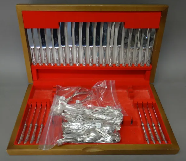 A silver King's pattern canteen of table flatware, comprising; nine table forks, nine dessert spoons, two tablespoons, eighteen dessert forks, nine fi