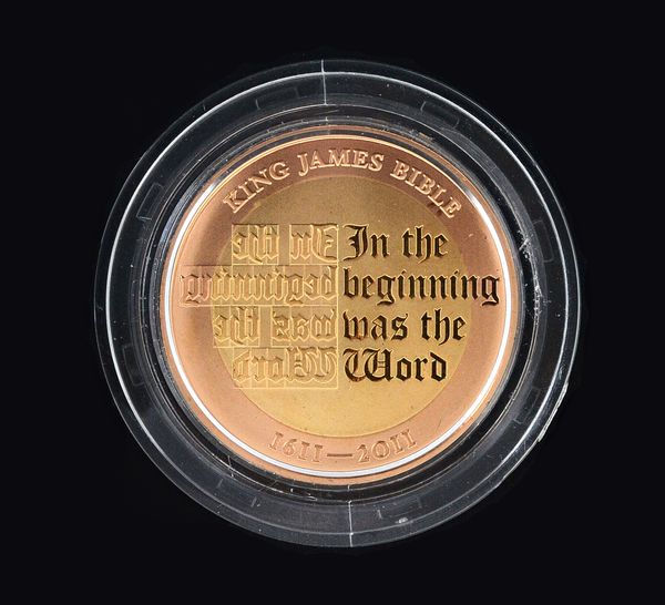 A gold proof two pounds coin, 2011, commemorating The King James Bible, with a certificate, case and box.  Illustrated