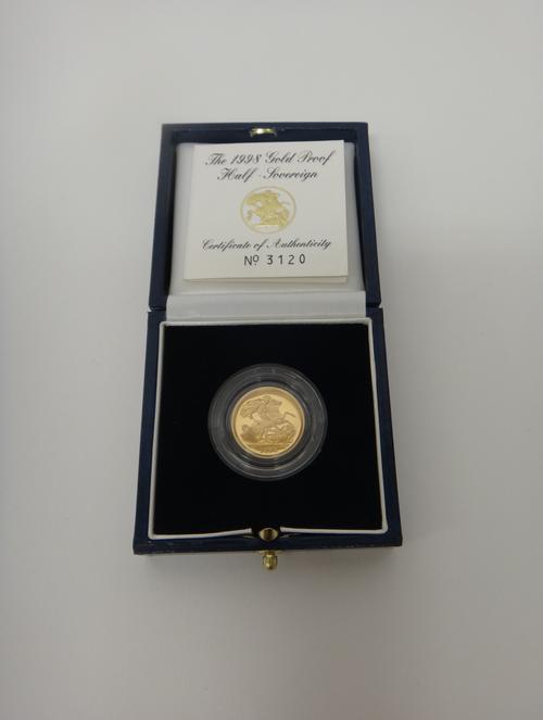 An Elizabeth II proof half sovereign 1998, with a Royal Mint case and certificate card.