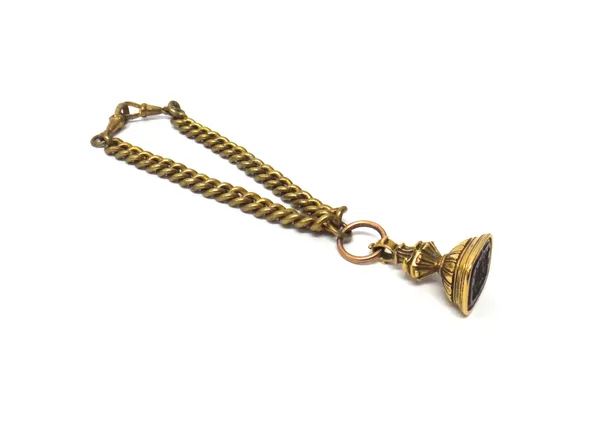 A Victorian gold cased cornelian pendant fob seal, the dark cornelian matrix seal engraved with a shield, the top fitted with a split ring and attache