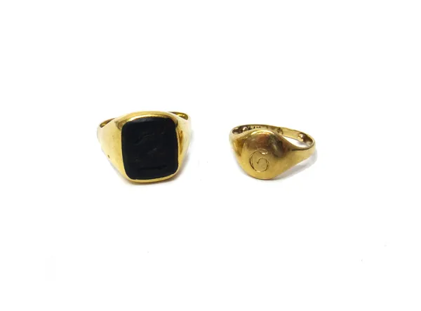 A gold and bloodstone set signet ring, crest engraved, detailed 18 CT, ring size O and a half (note arthritic bobbles) gross weight 7 gms and a gold o