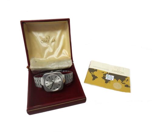 An Omega Automatic steel cushion shaped cased gentleman's bracelet wristwatch, the signed silvered dial with baton shaped numerals, centre seconds and