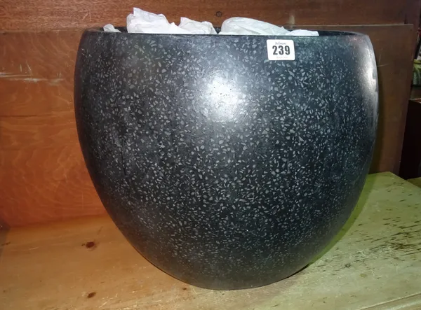 A reconstituted composite stone jardiniere of ovoid form, 48cm wide x 40cm high.  F9
