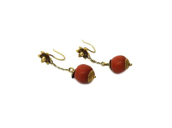 A pair of gold and coral earrings, each with a flowerhead shaped top and with a pendant coral bead fitted to a chain, the tops with  hoop shaped wire