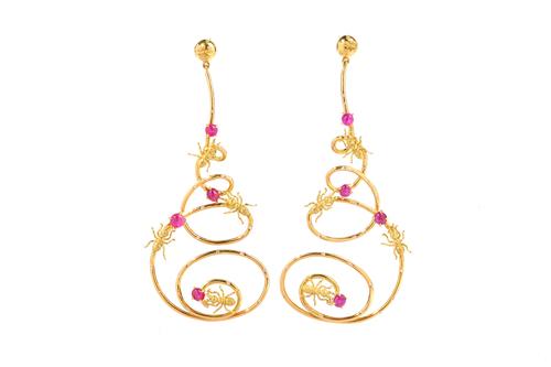 A pair of gold, cabochon ruby and diamond set pendant earrings, each of bold scrolling form, with insect motifs, claw set with four cabochon rubies an