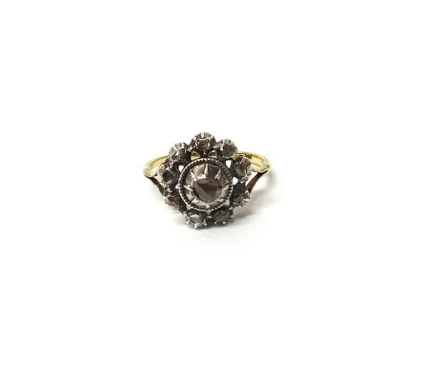 A gold and silver set rose diamond set cluster ring, mounted with the principal rose diamond at the centre, in a surround of smaller rose diamonds, (o