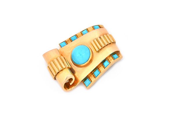 A gold and turquoise set Egyptian style clip brooch of tapering scroll form, circa 1940, set with a circular turquoise to the centre, the sides set wi