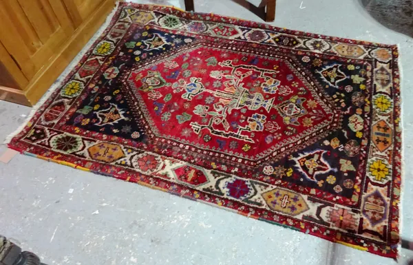 A modern rug of South Persian design, 163cm x 111cm.
