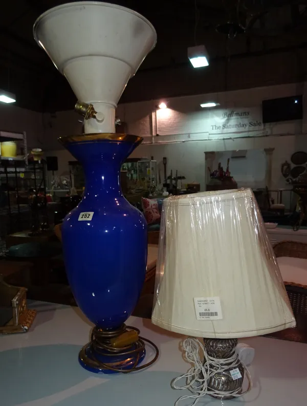 A large blue and gilt glass vase, later modified to a lamp, and a small oil lamp also later converted, (2).  H5