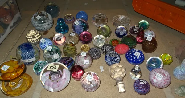 A group of assorted 20th century glass paperweights, of various makes, (qty).  S4