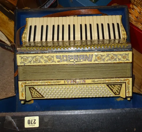 A Soprani piano Accordion, cased.  K1