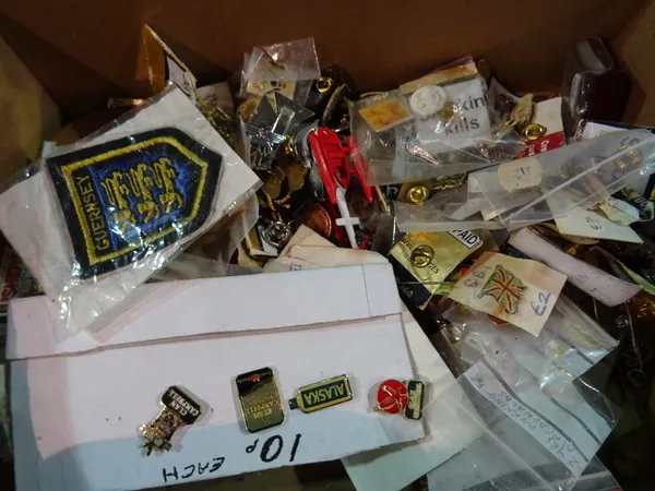 A quantity of assorted decorative buttons and badges, (qty). C