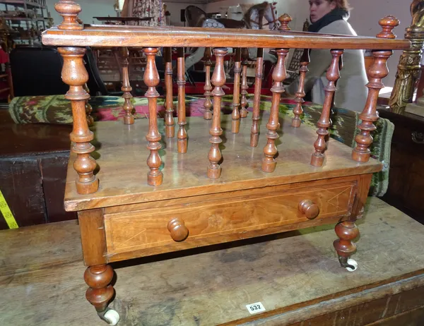 A Victorian mahogany three division Canterbury, on bobbin turned supports, 55cm wide x 49cm high.  E9