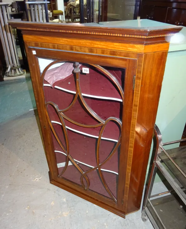An Edwardian mahogany and satinwood hanging corner cabinet, 79cm wide x 109cm high. M10