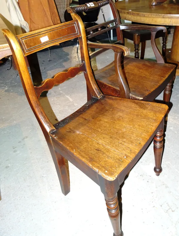 An early 19th century birch East Anglian carver chair, together with three similar single chairs, all on turned supports, (4).  G5