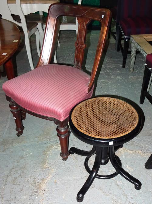A Victorian ebonised Piano stool on four outswept supports, 38cm wide x 42cm high and a pair of Victorian mahogany hall chairs on ring turned tapering