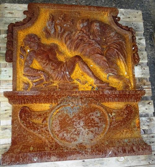 An 18th century cast iron fire back, in the Neo-Classical taste, (a.f). OUT