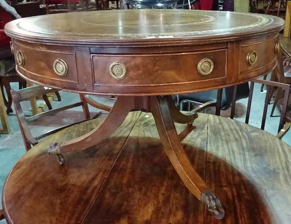 A Regency style mahogany drum table, with leather inset top and four drawers, 90cm diameter x 76cm high.  B6