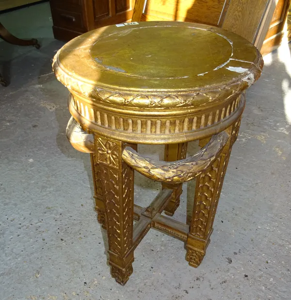A Louis XVI style gilt wood jardiniere stand, with floral swag decoration, on square tapering supports, 41cm wide x 61cm high.  A9