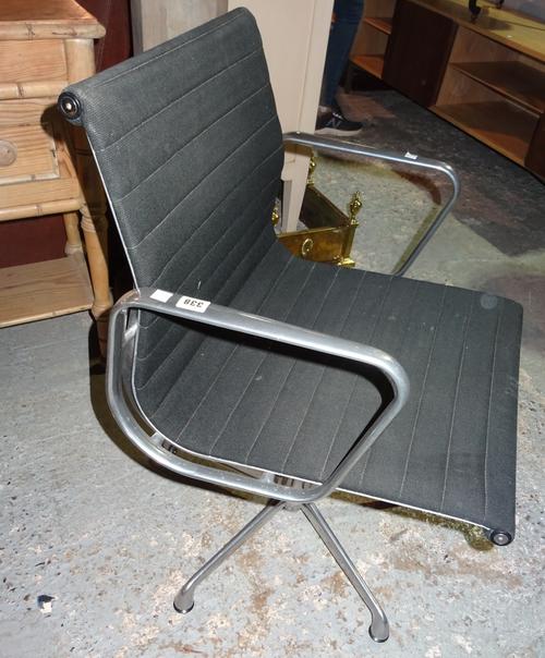 A 20th century chrome office swivel open armchair.  A8