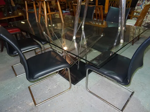 A 20th century glass and chrome rectangular dining table, with marble base, 180cm wide x 76cm high.  D6