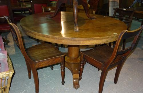 A Victorian mahogany circular breakfast table, on trefoil base and scroll supports, 126cm wide x 83cm high.  G5