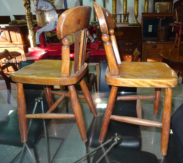 A pair of 20th century elm child's stick back chairs, (2).  G5