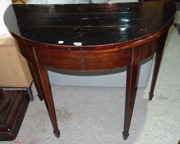 A George III mahogany card table, on square tapering supports, 93cm wide x 77cm high.  I4