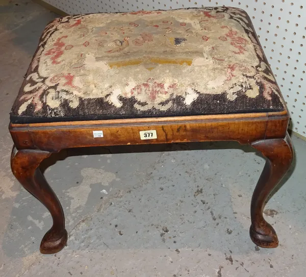 A George III style walnut rectangular footstool, on cabriole supports with hoof feet, 52cm wide x 44cm high. J2