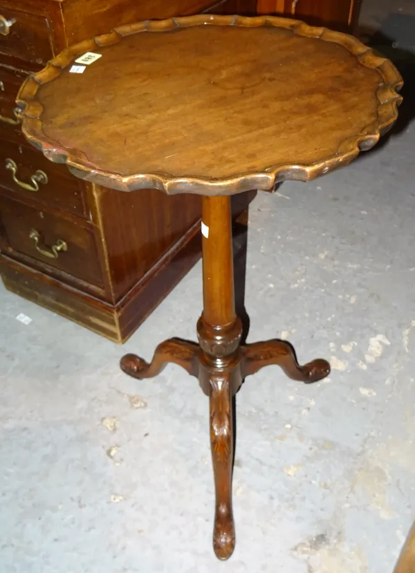 A George III mahogany tripod table, with pie-crust top, on acanthus carved supports, 45cm wide x 70cm high. J2