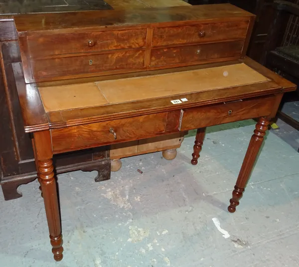 A Regency walnut lady's writing desk, on fluted supports, 95cm wide x 89cm high.  H9