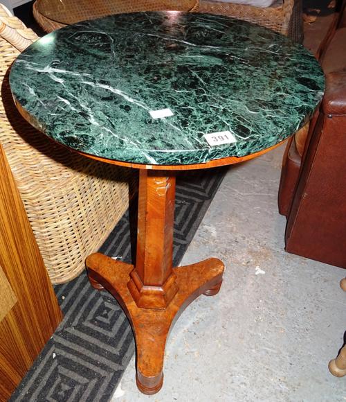A Regency style walnut occasional table, with tapering octagonal column and circular marble top, 46cm wide x 74cm high.  H4