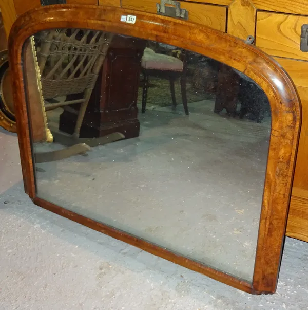 A Victorian walnut framed overmantel mirror, 112cm wide x 86cm high.  A4