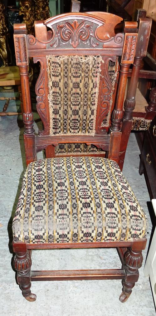 A set of six Victorian mahogany framed dining chairs, with carved top rail, (6).  EXTRA