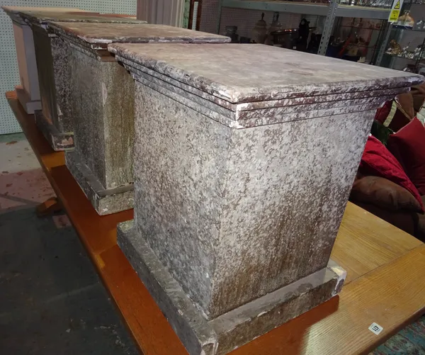 A group of three 20th century grey painted pedestals, on square plinth bases, together with a white painted pedestal, 45cm wide x 54cm high, (4).  E2