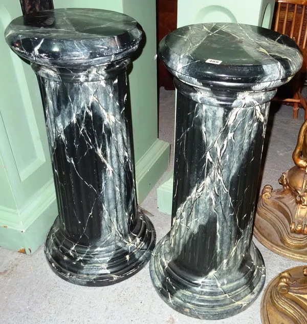A pair of 20th century faux marble columns, with fluted central column on plinth base, 34cm wide x 83cm high, (2).  L5