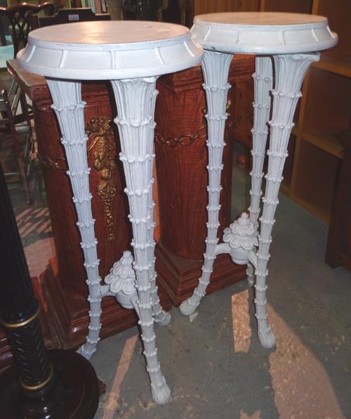 A pair of 20th century white painted jardiniere stands, each with circular top on three naturalistic tapering supports, 40cm wide x 106cm high, (2).