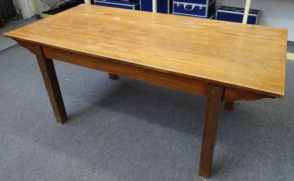 A 19th century French style oak plank top kitchen table, on block supports, 183cm long x 88cm wide x 77cm high.  H5