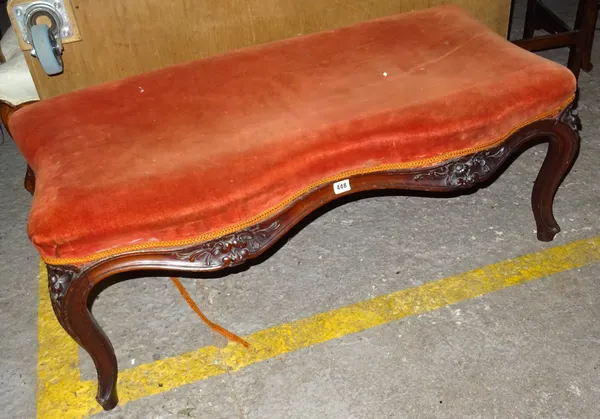 A Victorian mahogany framed rectangular serpentine footstool, on cabriole supports, 103cm wide x 43cm high.  LK4