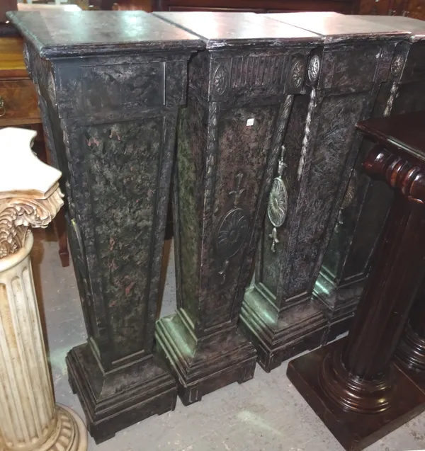 A set of four 20th century faux marble Empire style jardiniere stands, with square tapering central column, 30cm wide x 115cm high, (4).  M7