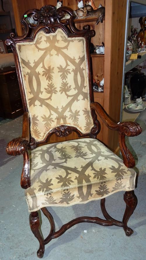 A set of seven 17th century Flemish style carved and stained beech high back dining chairs, with shaped stretcher, two include one carver, (7).  H2