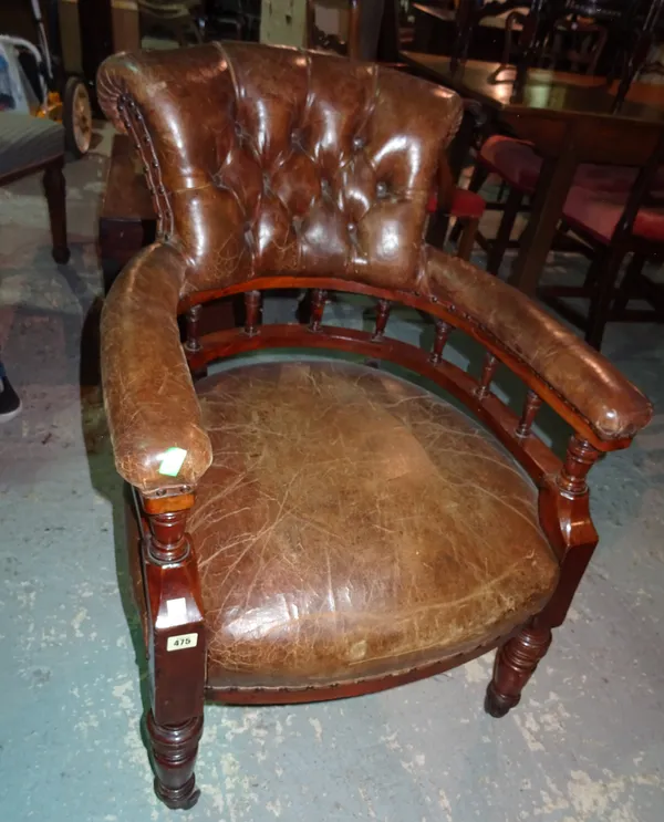 A Victorian mahogany framed tub back chair, with brown leather upholstery, 61cm wide x 92cm high.  G7