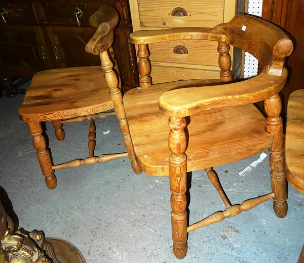 A set of four early 20th century pine chairs, to include two open armchairs, (4). EXTRA