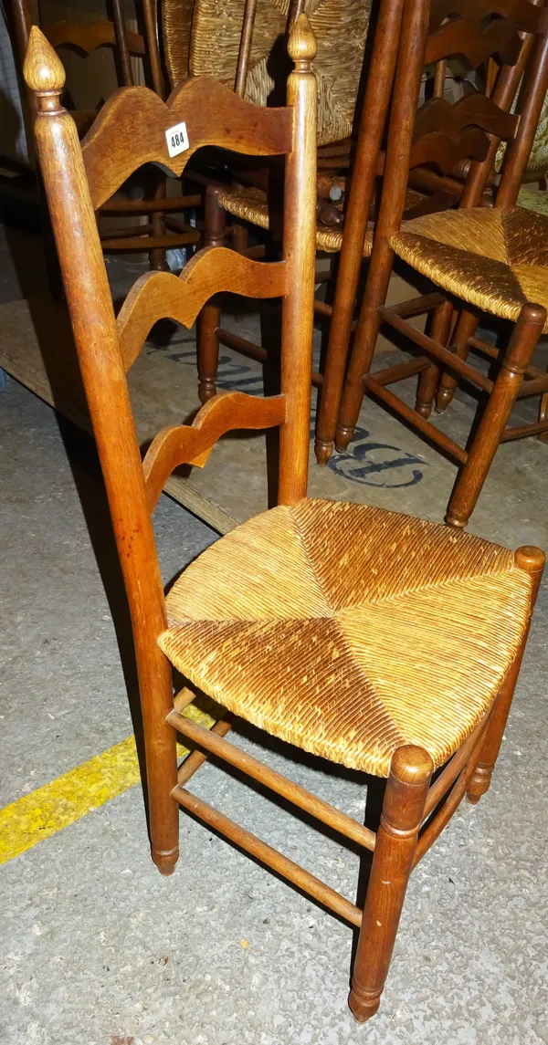 A set of six 20th century oak ladder back dining chairs, (6).  E2